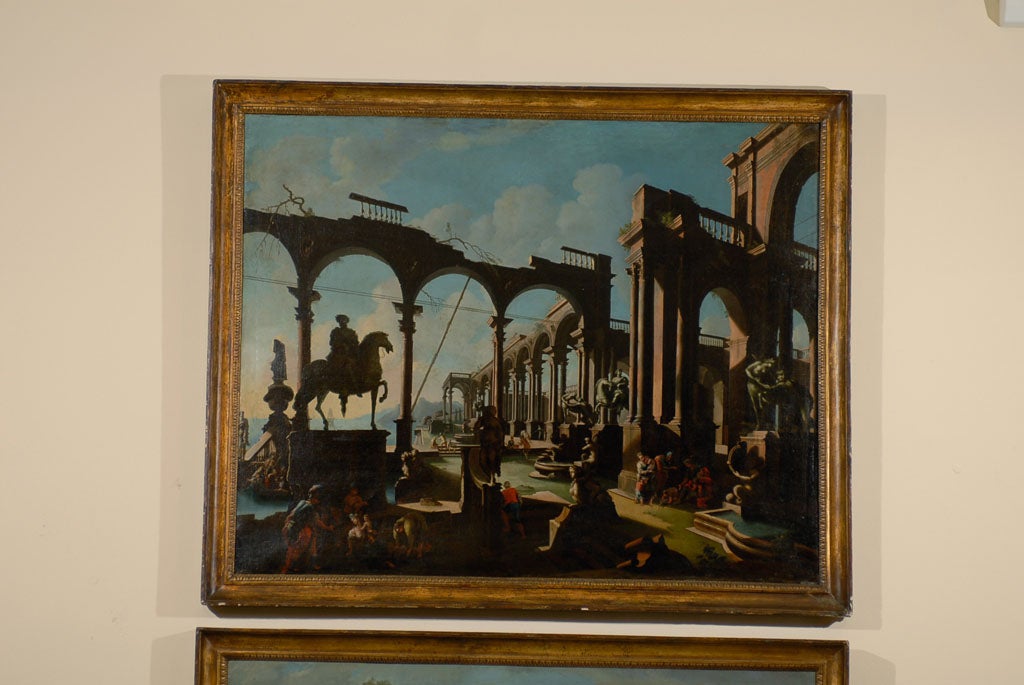 A Baroque period pair of classically-inspired landscapes by Italian artist Giovanni Ghisolfi.  <br />
<br />
Ghisolfi was born in Milan in 1623 and died there in 1683.  The artist first trained with his uncle, Antonio Volpino, before traveling to