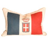 Vintage flag pillow on antique linen
