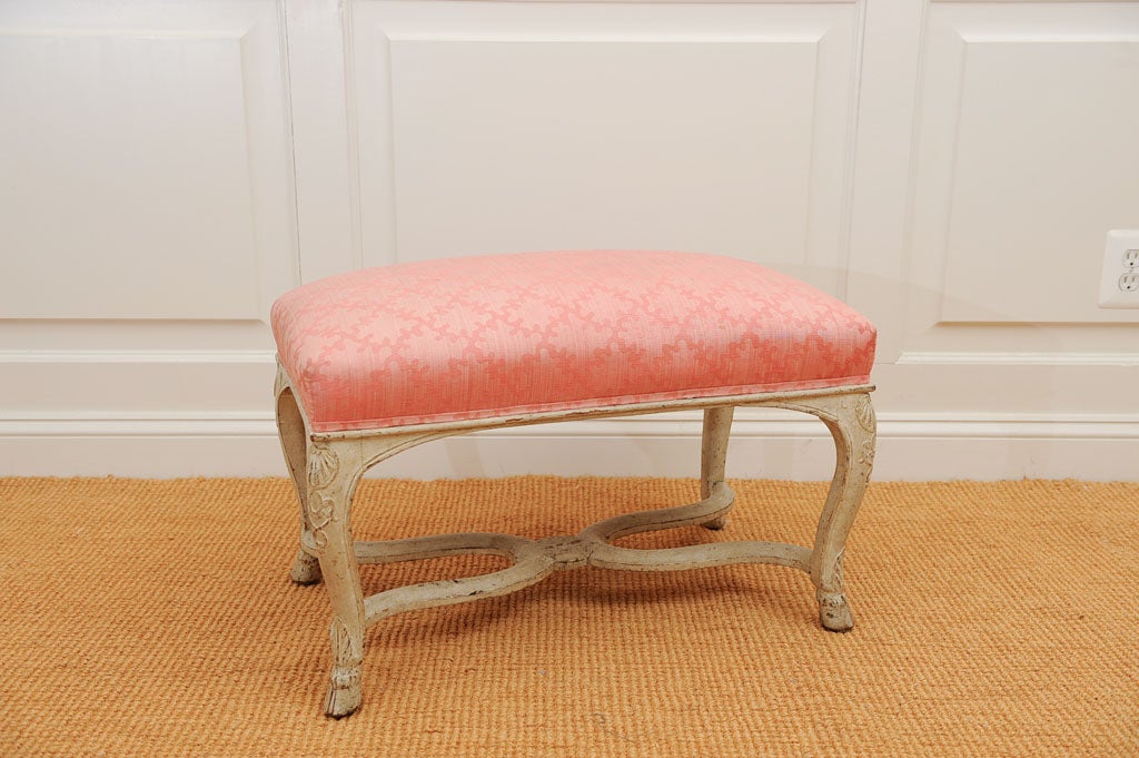 delightful old painted Regence carved ottoman with split hooved feet, serpentine cross bar, shell motif

View our complete collection @ www.hollisandknight.com