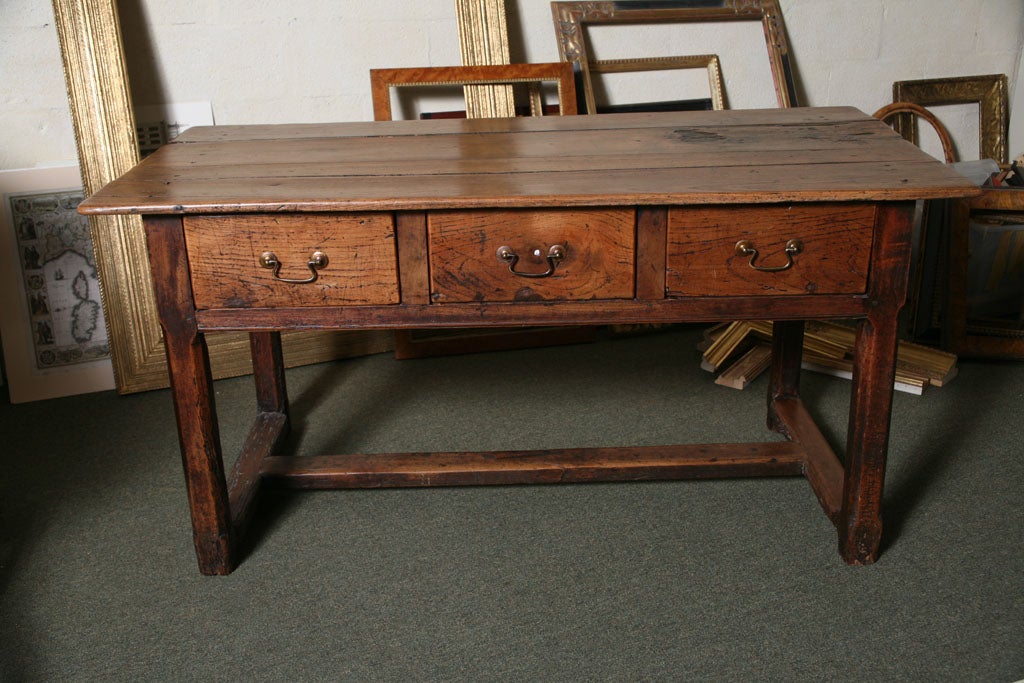 French refectory table with three drawers.