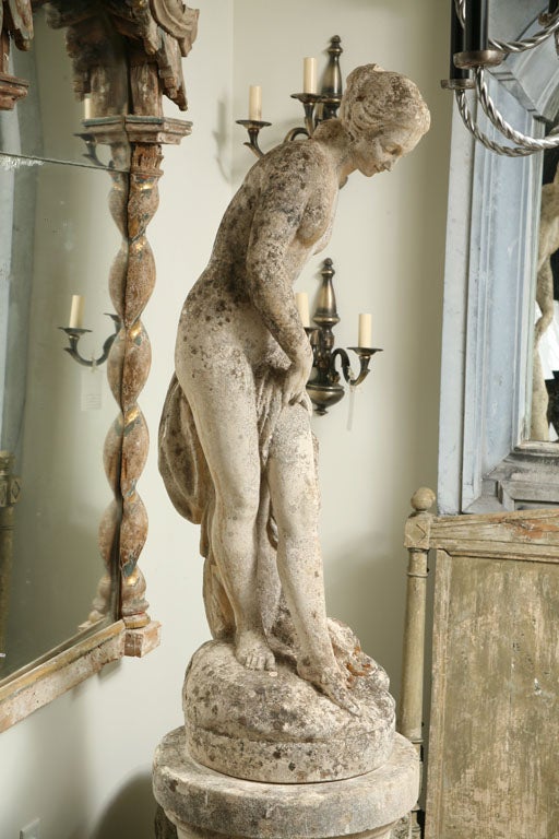 A Composite Stone Garden Statue of Lady stepping into a Bath in Neoclassical Style Pose <br />
 Original Plinth is available,beautiful Patina.<br />
Plinth Dimension: 19