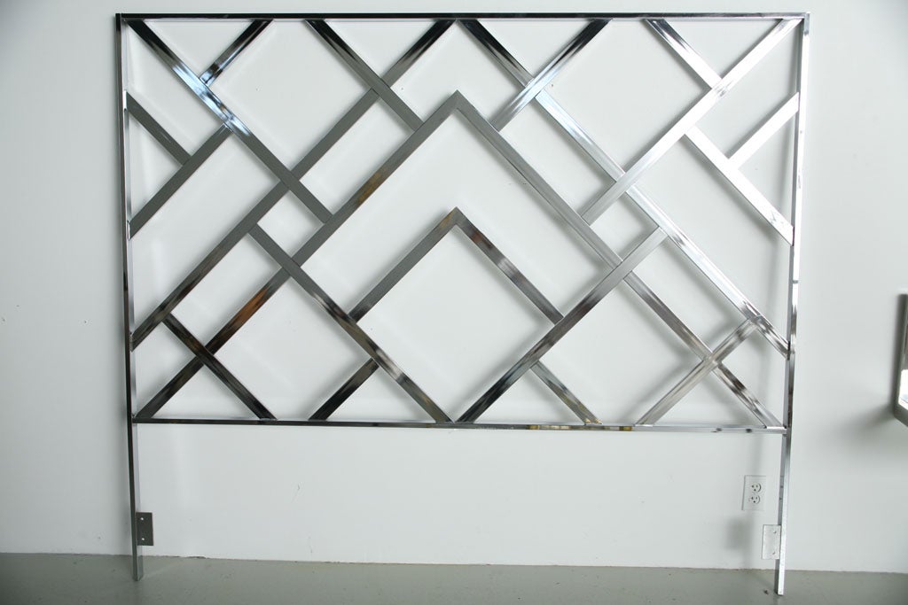 Heavy chrome bars form a strong geometric pattern. Fine original condition, fine construction. By Design Institute America, late 1960s.