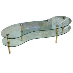 An Italian Moden Two-Tier Brass and Glass Cocktail Table