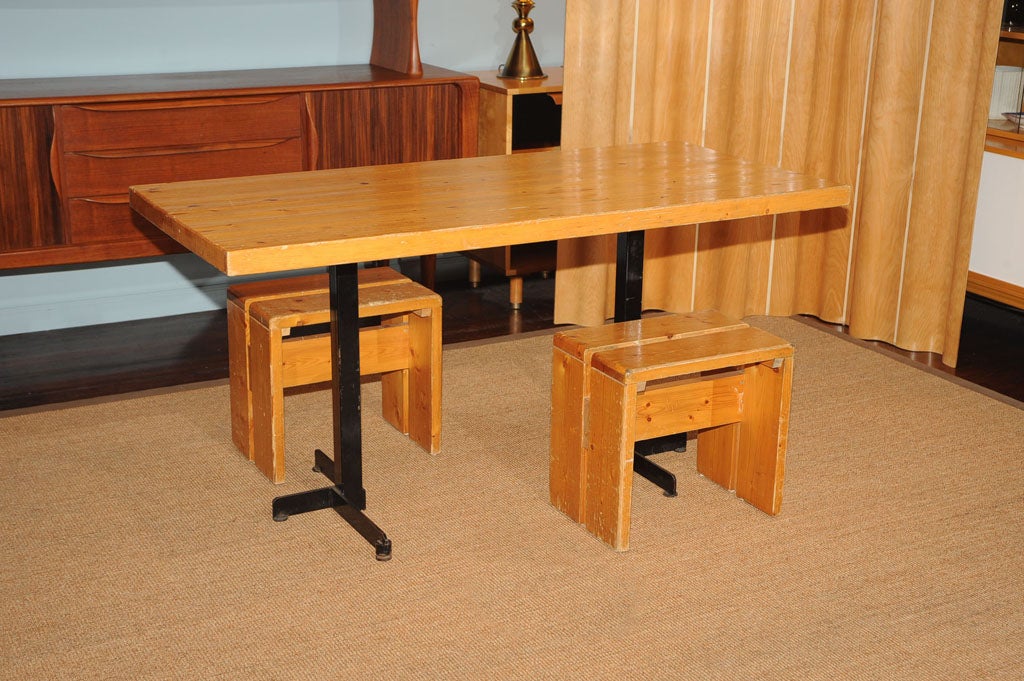 Rare set of Charlotte Perriand Les Arc dining table with two stools. Very good original condition. 
Reduced in price to Net $4000.00