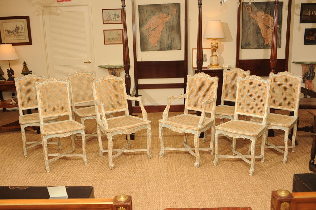 A set of Regence style dining chairs