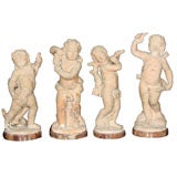 SET OF 4 FRENCH TERRACOTTA FIGURES