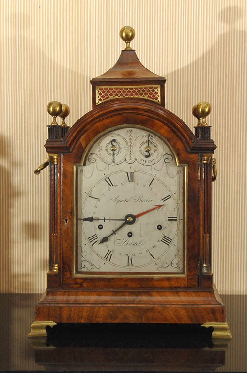 an arch top triple fusee bracket clock, fruitwood with an engraved silver dial showing Strike / Silent, fine regulation adjustment, dial shows maker and unusual calander, back not original (fig. 10), gong added later 

Barber is listed in Brillie