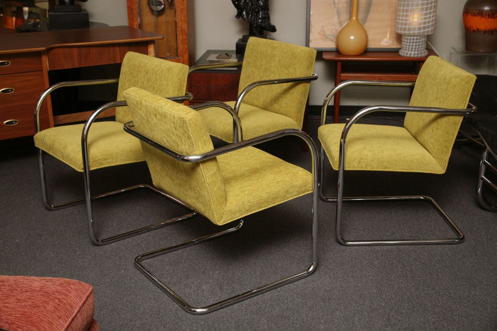 SOLD JULY 2011Very fresh & striking, upholstered in a moss green velvet, these four Mies Brno chairs are quite memorable.  Bright shiny one piece cantilevered tubular chrome steel artfully forms the base, legs, arms and back with the upholstered