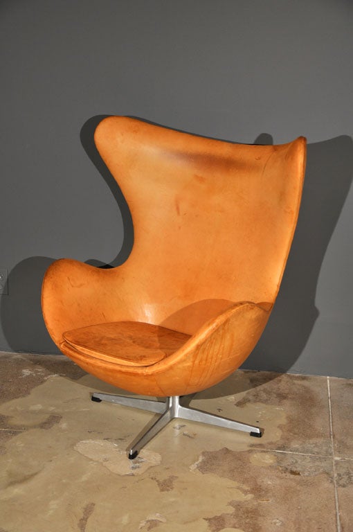 an early edition egg chair with original leather and in original condition.