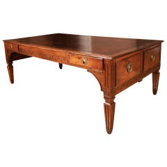 An Imposing Neoclassical Walnut Writing Table