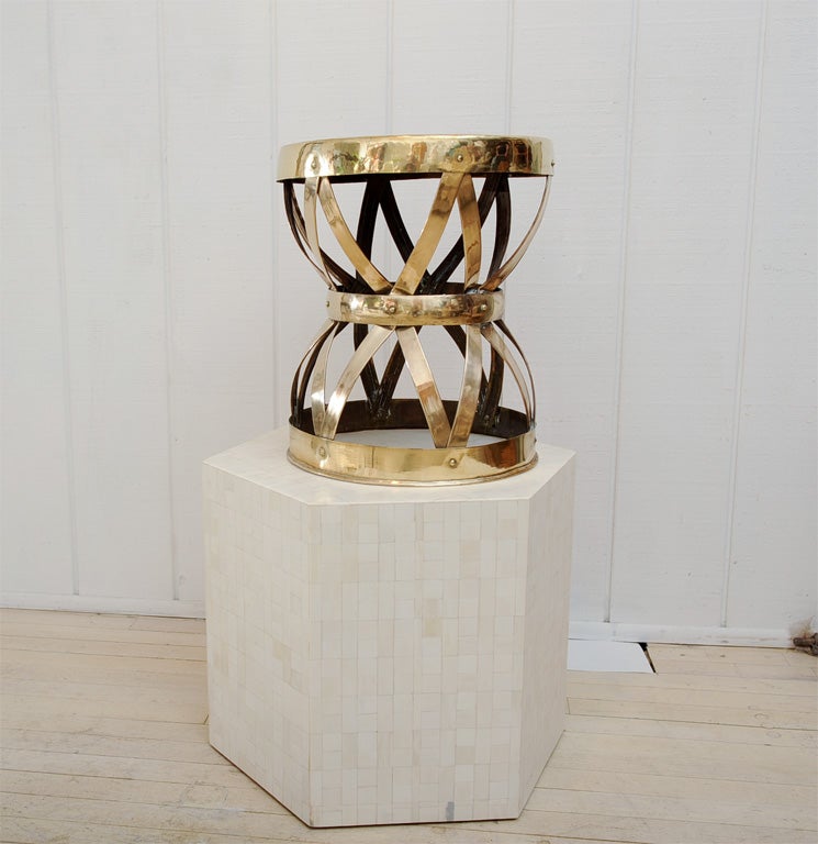 Great strapwork brass stool or occassional table with copper rivets.  This piece is substantial, and brass strapwork is thick and sturdy.  Nice hourglass form.  Stamped 