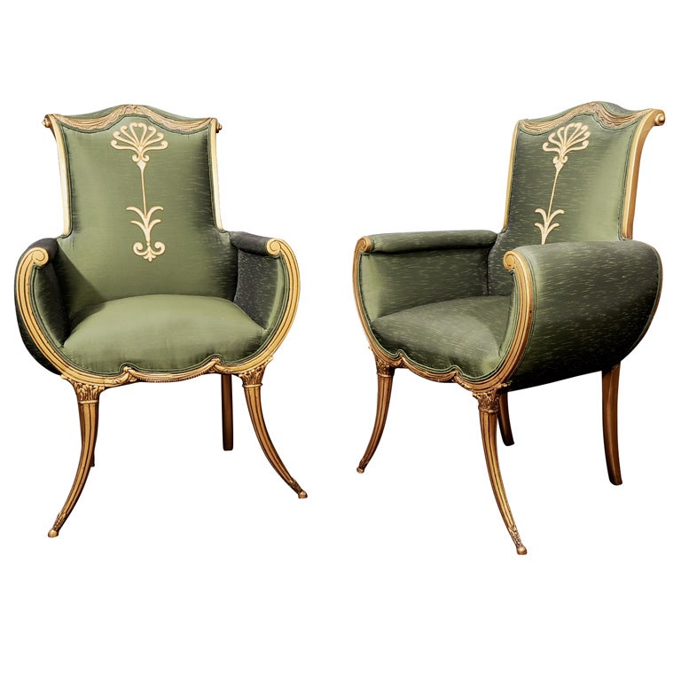 A Most Graceful Pair of Hollywood Regency Armchairs