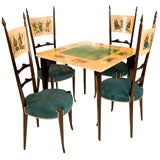 An Italian Parchment and Mahogany  Game Table and Chairs