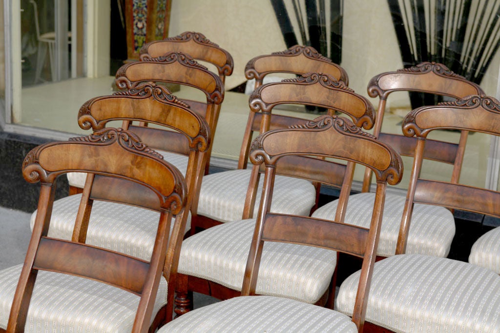 Elegant set of 10 dining chairs, Danish Beidemeier c 1840 in mahogany with carved scrolling on back rails and turned legs