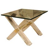 Pair of lucite cross leg side tables with brass accents