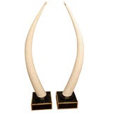 Pair of stone veneer tusks by Maitland Smith