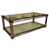 Two tier gun metal and brass cocktail table