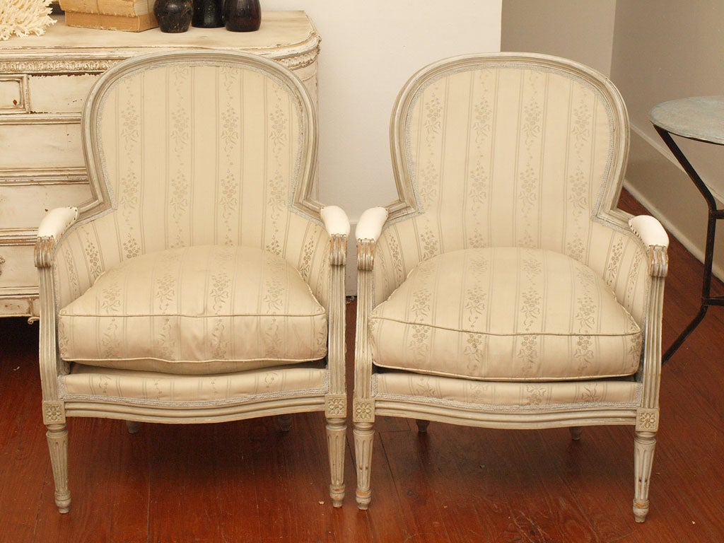 I find these completely irresistible -- from their original pale grey worn and faded paint to their original imported silk Scalamandre fabric upholstery and down cushions. Beautifully aged and faded. I could not bring myself to recover these