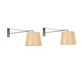 Pair of swingarm sconces by Lunel