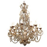 19TH CENTURY ITALIAN CRYSTAL, IRON AND WOOD CHANDELIER 19TH CENTURY ITALIAN CRYSTAL, IRON AND WOOD CHANDELIER