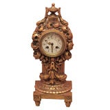 Carved gilt wood clock