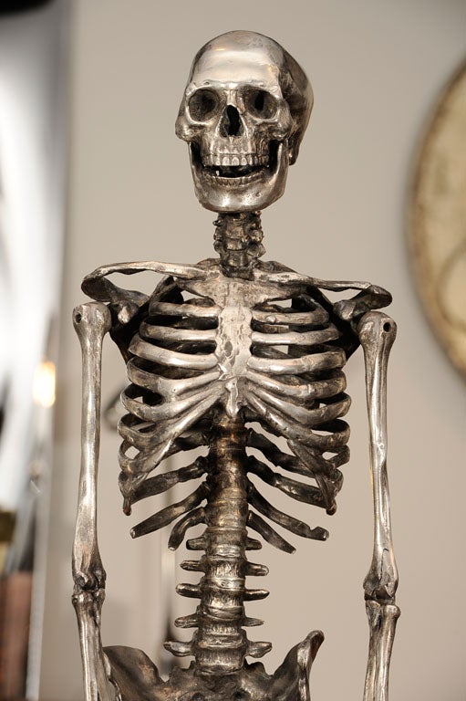 This remarkable skeleton is a 1940s handmade silvered bronze anatomic model made in America. We have added the custom stand.