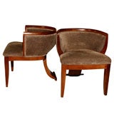 A Pair of Low Barrel Chairs