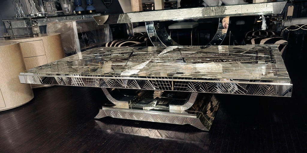 Custom majestic French Art Deco style mirrored table. An extraordinary stunning table piece with cut mirror glass in Art Deco style motif details all done by hand. Customization is available in different sizes and shape.