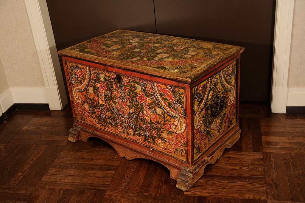 Distinctive Hand-Painted Tyrolian Lift-Top Trunk with Iron Handles and Original Metal Hinges, Featuring a Floral Design in Coral, Green, and Cream Tones on a Yellow Ground.  Interior of Lid Ornamented in Floral and Geometric Patterns. Austria, Mid