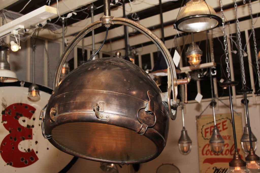 Overhead, industrial, copper, G.E. light.  Perfect for dining with a 30.5