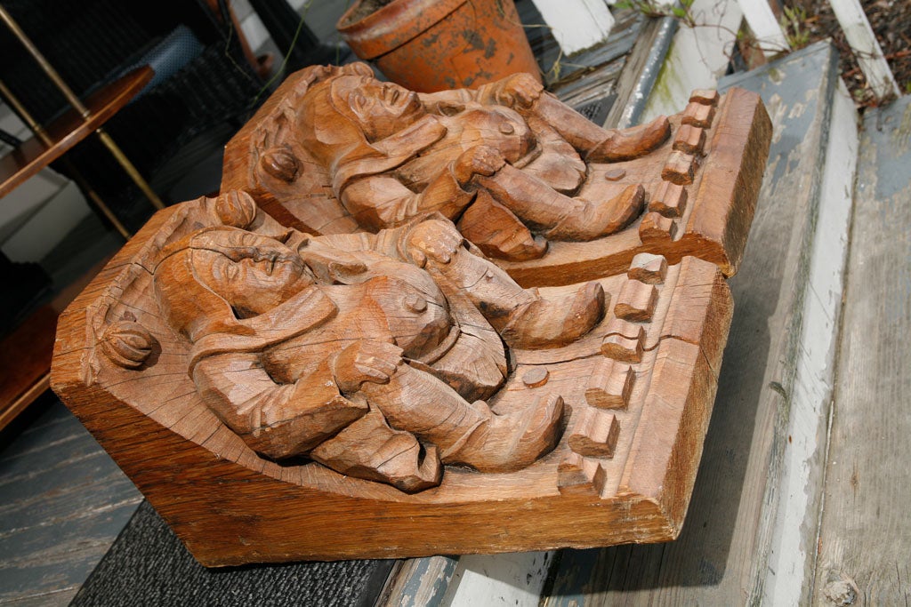 These massive carvings of medieval style are excellent examples or the wood carves skill. Original used as part of the architectural elements under the entablature of a ceiling or at the ends of exposed beams around a room. Perfect to use now as