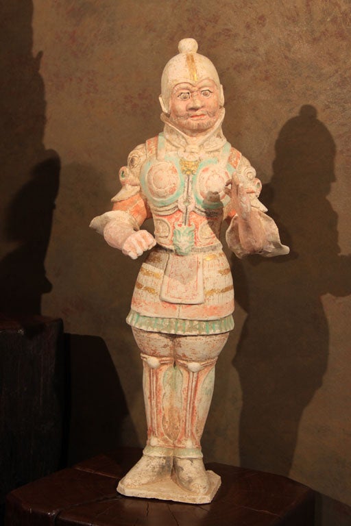 Chinese Tang Dynasty ceramic model of a military officer. Well modeled and with significant traces of the original pigments and painted detail including highlights in gold leaf. Very fine and rare example.<br />
Consistent with Oxford thermo