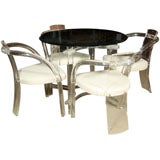 Lucite Set of Four Chairs and Table