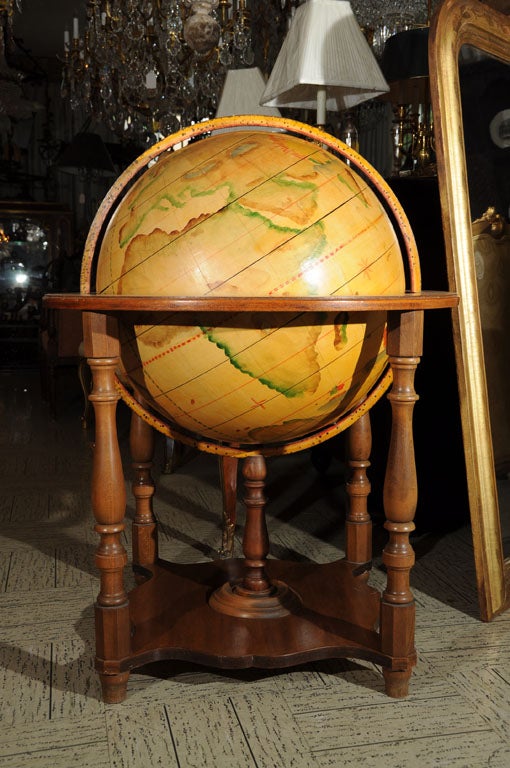 decorative globe in pastel painted tones