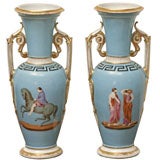Pair of Paris Porcelain Urns With Classical Motif