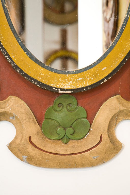Ornately carved American carousel mirror.  Great alligatored original paint surface.