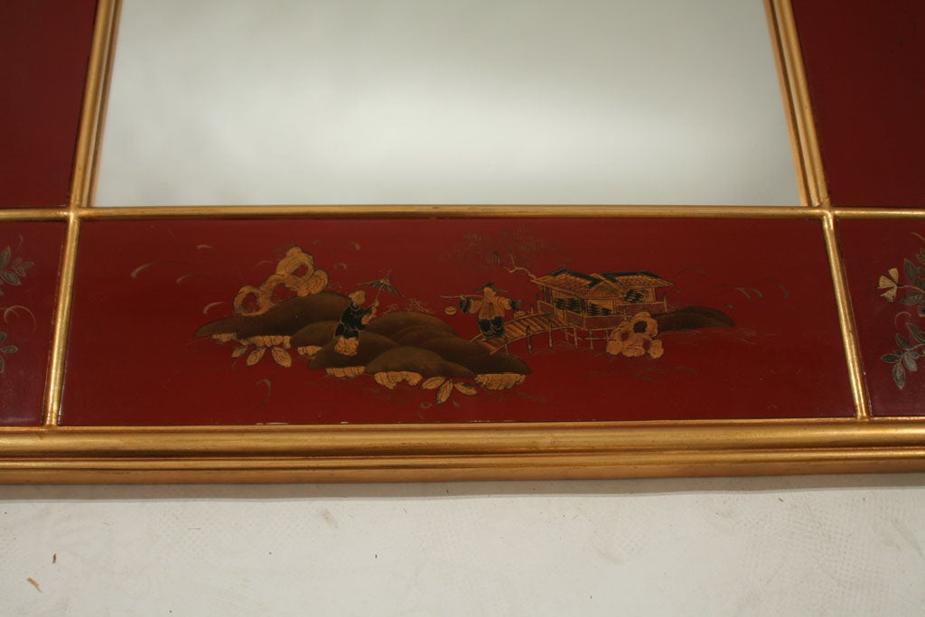 A Red Lacquered and Gilt-Decorated Panel Framed Mirror In Good Condition In Palm Beach, FL