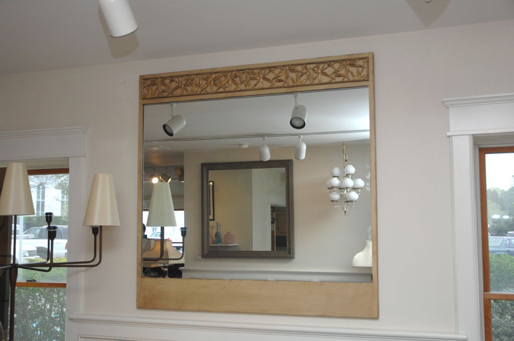 Large framed mirror in  glazed cerused oak finish with a wonderful border of caved bamboo detailing across  the top in a gold leaf finish by JAMES MONT