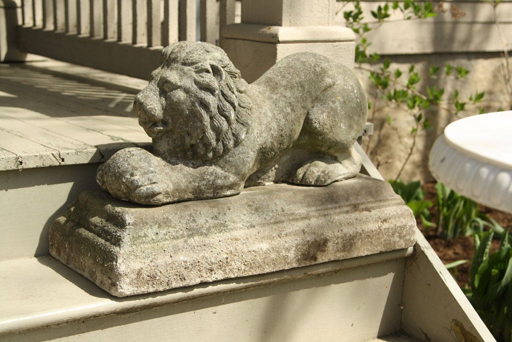 20th Century Pair of Cast Stone Lions with Balls