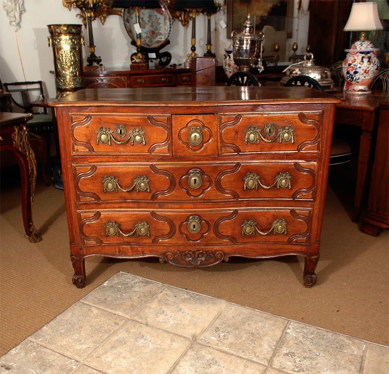 a signed Louis XV commode with three drawers above two long drawers, they have raised panels with carved c curves, a heavily carved apron, signed H. ROUX on the left side in the upper right corner (Image 7)