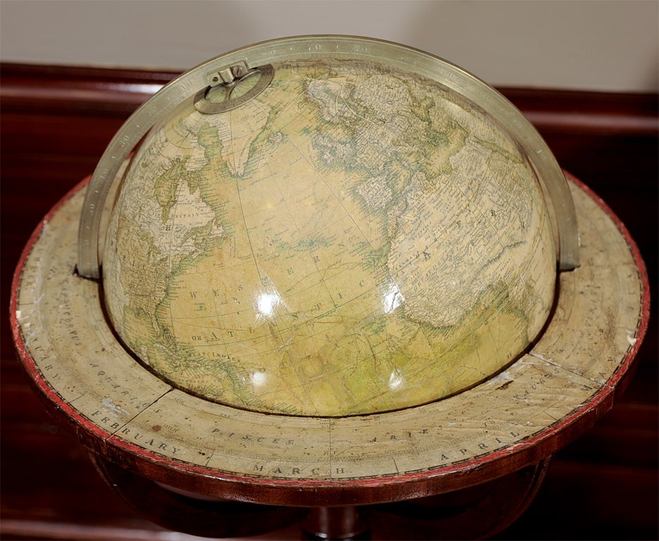 Pair of Library Globes Showing Discoveries in Texas For Sale 1