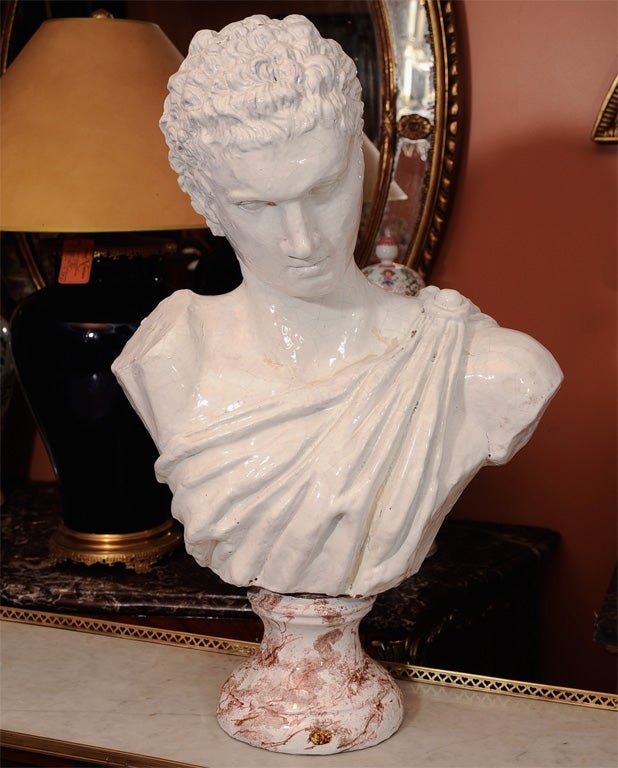 Pair of Neo Classic Roman painted Terracotta busts with faux marble bases.