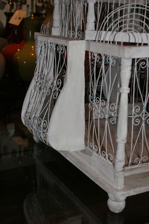 A Spanish Painted and Carved Birdcage 6