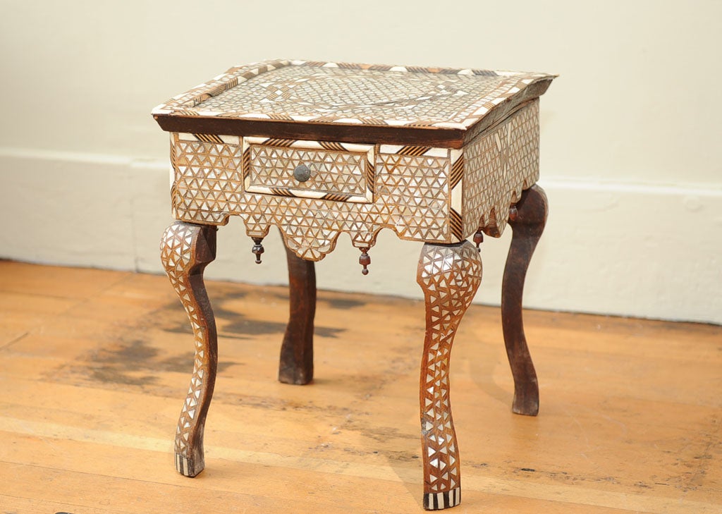A North African small inlaid single drawer table