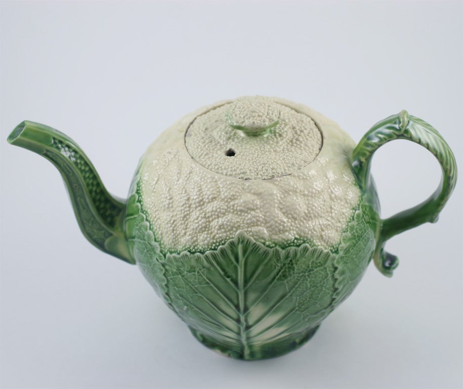 A rare and fine Wedgwood creamware pottery cauliflower teapot decorated in underglaze oxide colors