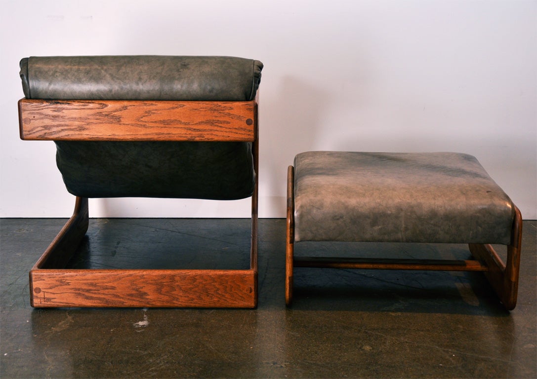 Oak and upholstered chair and ottoman by Lou Hodges 1