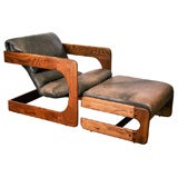 Oak and upholstered chair and ottoman by Lou Hodges
