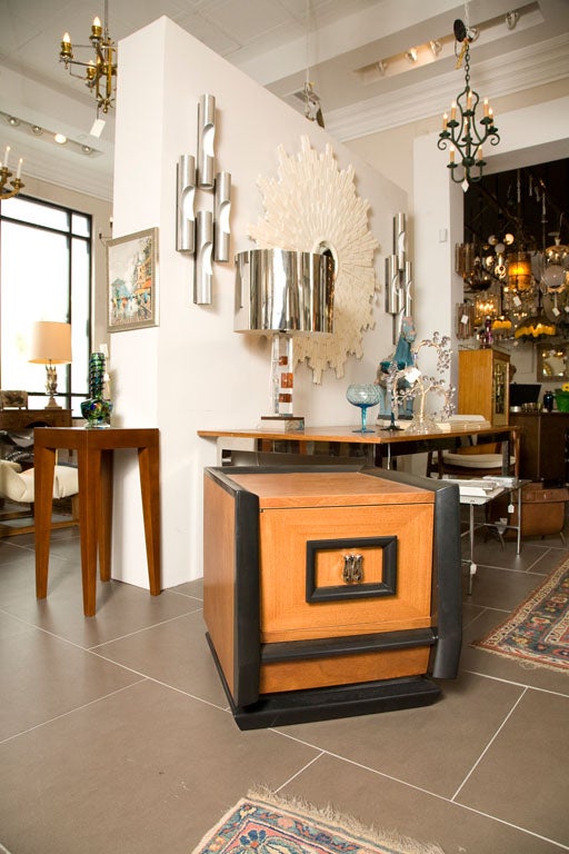 Beautiful ebonized wood that frames the cherry wood table with Asian style hardware.