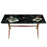 Fornasetti Coffee table with  laquer and brass base by Gio Ponti