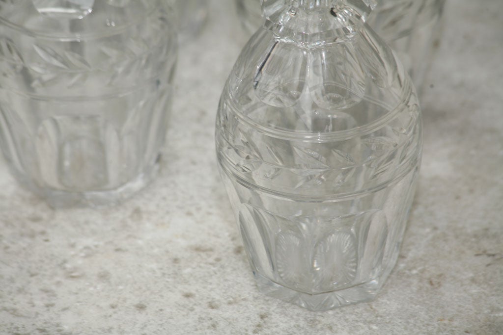 A set of four Cut Crystal Decanters